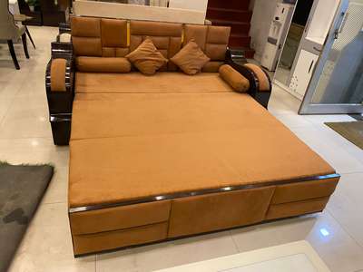 modern wooden sofa bed

price -17500

 Description -: sofa beds are like primary sofas that can be pulled or folded out to from a bed 

 

Primary material -: wood 

Usage /application -: living room

Storage included -: yes 

Shape -: rectangular

Style/design -: modern

Seating capacity -: 3 seater

Sofa bed type-: foldable
