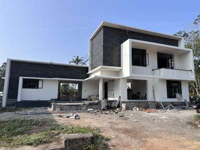 Finishing stage 
Contemporary design #ContemporaryHouse  #HouseConstruction  #semi_contemporary_home_design  #contemporary  #budgethomes  #budget_home_simple_interi  #keralahomeplans  #ContemporaryDesign #constructioncompany  #ConstructionCompaniesInKerala