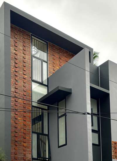 A compact urban residence defined by exposed brick, clean grey volumes, and bold geometric lines. A warm, contemporary home crafted for seamless city living.
Client: Staish Madhavan | 1530 sqft | 4 Bedroom Residence
#Architecture #ResidenceDesign #ContemporaryHome #BrickFacade #ModernArchitecture #UrbanLiving #ArchitecturalDesign #MinimalDesign #koloprojects