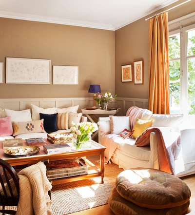 Combine different shades of brown with touches of orange and purple. Get this look with wooden coffee table, off-white sofa with cushions of different pattern, brown comfy floor cushions and orange curtains. Add flowers, vases and baskets for decoration.
#interior #decor #ideas #home #interiordesign #indian #colourful #decorshopping