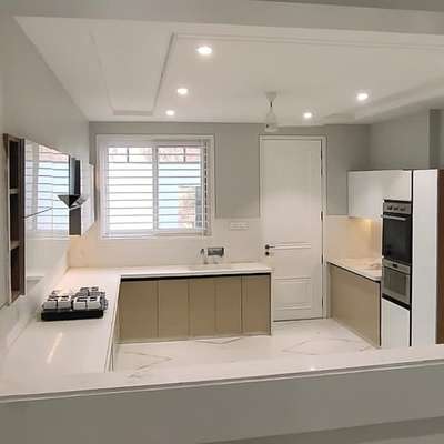 semi modular kitchen #civilwork on quartz ,4mm Back painted glass shutters #appliances #Bosh
contact us : 79874 04532