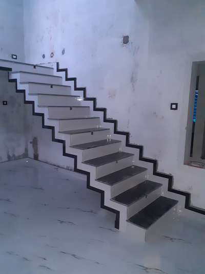 chain stair tails(marbonite) and granaite simple design with black and white combination
 #taileswork  #StaircaseDesigns  #stairtailwork  #granitetailcombination  #whiteandblackstaircombination  #stairtailsdesign #FlooringTiles