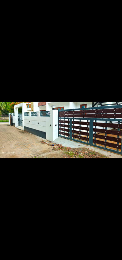 Modern Gate. In duck wood design & sliding. Also wall design. Finnished work.
Happy Customer.

#Roofing  #modernroofing #FlatRoof  #RoofingDesigns  #trussroof  #trusswork  #trussworks  #trussworkmaterials  #gates  #slidinggate  #moderngatedesign