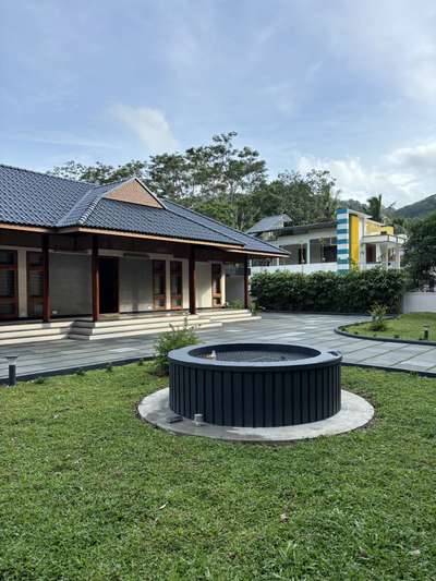 A contemporary take on traditional Kerala architecture, this residence brings together timeless proportions, pitched roofing, and warm wooden detailing with a refined modern sensibility. The long, symmetrical frontage opens into a calm and inviting central axis, creating a strong architectural presence rooted in regional context. Subtle material tones, deep verandah edges, and crafted lattice elements enhance both aesthetics and climate responsiveness.Developed in collaboration with PCA, the design blends tradition and modern comfort, creating a home that feels grounded, serene, and contextually connected.
2800 sqft | Client: Sibi | Location: Amboori, Trivandrum
#Architecture #KeralaArchitecture #ContemporaryTradition #ModernResidence #RegionalDesign #ArchitecturalDetails #CourtyardHome #TrivandrumHomes #koloprojects