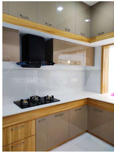 Kitchen Interior
 7012656756

#KitchenIdeas 
#KitchenInterior 
#ModularKitchen 
#OpenKitchnen 
#Workarea 
#hood 
#overheadshutter 
#KitchenCabinet 
#ebcofindia