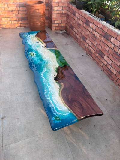 "We do customized epoxy furniture to decorate your home. Epoxy clocks, Epoxy Name boards, Epoxy Tables, Dining table, Epoxy Wall murals, Cup boards, TV Cabinets, Room partitions are few of the products we specialize in. We work with renowned architects to design the home decors aligning to the base theme." #epoxytables  #HouseDesigns  #DiningTable