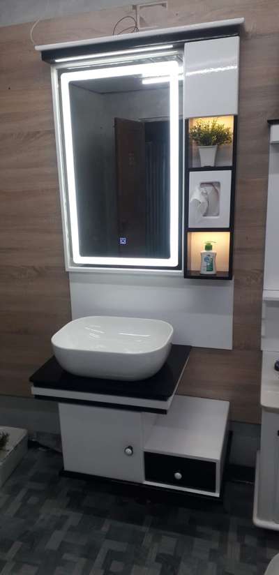 wash basin with cabinet box
with touch mirror 
5 year warranty 
all Kerala delivery
for details and order contact:
9207688886 

 #Cabinet #BathroomCabinet #KeralaStyleHouse