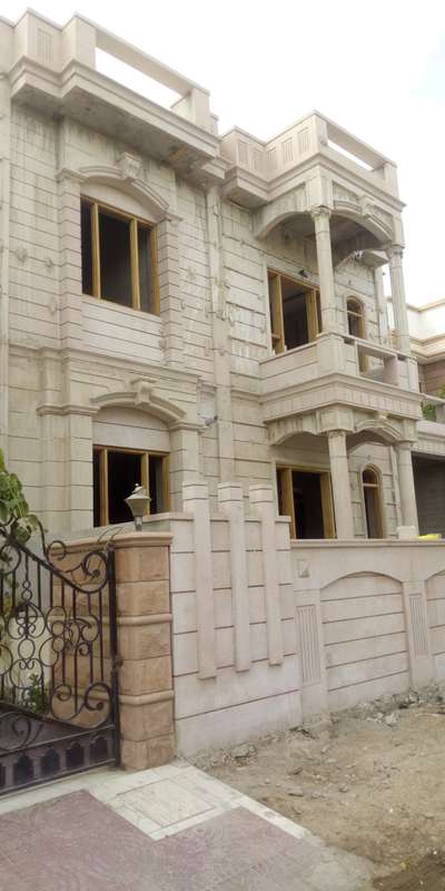 view from distance, good quality work in jodhpur stone elevation. having pillars, arch , plain kadau etc.
we are able to work all kind of design work in front elevation in jodhpur stone.