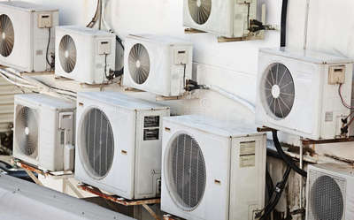 Repairing and Services of Many older air conditioners on the wall in Bank,Hotel, Hospital and Society