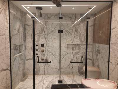 cubicle shower with black frame profile