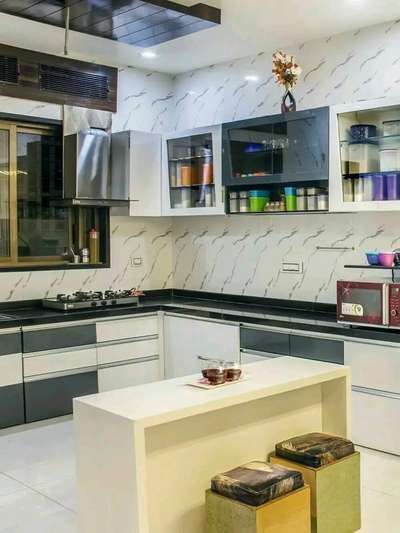 #ModularKitchen  #KitchenIdeas  #WoodenKitchen  #KitchenRenovation  #KitchenDesigns