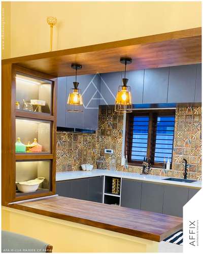 "The kitchen should be a joyful space, and the breakfast table is where that joy is shared each morning." #AltarDesign  #Architect  #architecturedesigns  #Architectural&nterior  #KitchenCabinet  #KitchenDesigns  #architectsinkerala