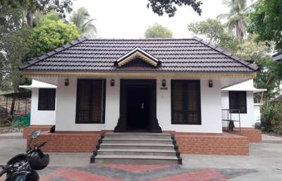 One of successful completed site at Palakkad district... It's a traditional house, Used only white and Grape colour combination