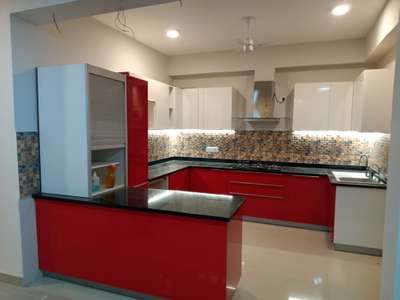 modular kitchen with red beauty.