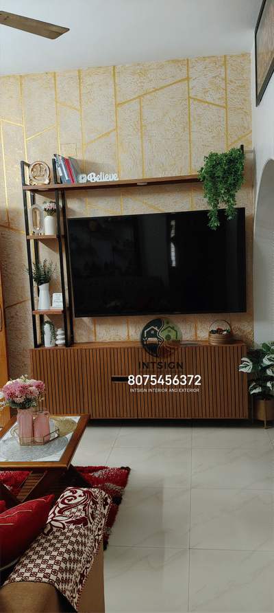 #tvunits #InteriorDesigner #Architectural #LivingroomDesigns #modularTvunits #louverpanel #intsignhomeinteriors