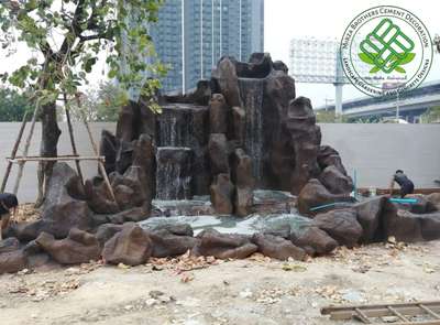 Concrete Artificial rock waterfall 

 #waterfall #concretedesign #cementartwork #Ferrocement #gardendesign #fountain #mirzabrotherscementdecoration