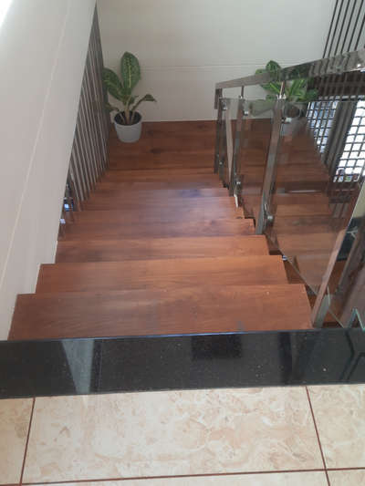 Wooden Stair case in Teakwood with Steel handrail & glass panels @ Trivandrum , Kulathur , near Infosis.