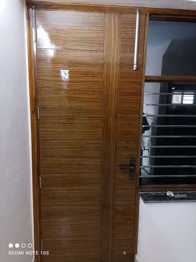 Flush Door teak vinear. #goodwood  #woodwork #HouseDesigns  #TeakWoodDoors