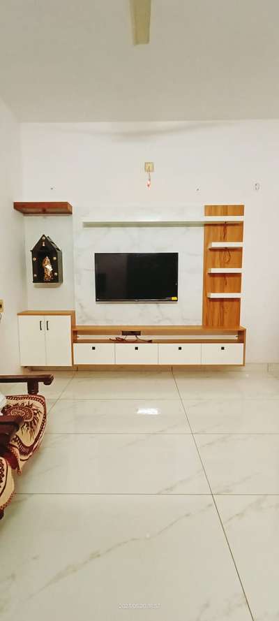 TV cum pooja unit 🌿
.
.
.
.
#darkbirddesigns #interiordecor #creative #keralainterior #LivingRoomTV#modularTvunits  #mica  #laminatedfinish  #keralahomeplans