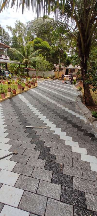 exterior paving stone laying with garden setting