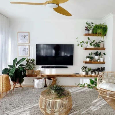 Style up your TV room with a beautiful woven rug and some wicker baskets. Take advantage of the empty area in the corner of the TV room for houseplant rack and fill it with different stylish white coloured vases.
#interior #decor #ideas #home #interiordesign #indian #colourful#decorshopping