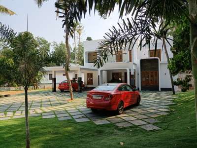 recently completed residence of Mr Beni Sadar. kollam #frontgate  #LandscapeDesign  #ContemporaryHouse  #frontElevation