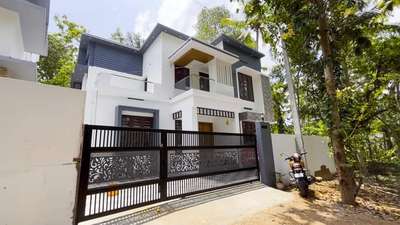 Modern contemporary design Home 
Client name: Mr.Aswin & Mrs.Aswathi
Location: Mannanthala Trivandrum 
Total square feet : 1,812 Sqft
Total budget: 41,67,600/- (with out interior)
GF: Sitout, Living, Dining, Reading Room, Master Bedroom, Guest Bedroom Kitchen, Work Area.
FF: Upper Living, Master Bedroom, Guest Bedroom, Balcony, Open Terrace.


#FullHomeConstruction #FrontElevation #Elevation #plan #3BHKPlans #HomePlanning #ExteriorDesign #LivingArea #HomeRenovation #InteriorDesign #InteriorDesigning #HomeConstruction #KitchenDesign #BedroomDesign #ElevationDesign #3dElevation #HallDesign #StaircaseDesign #HomeConstruction #DreamHome #AffordableConstruction