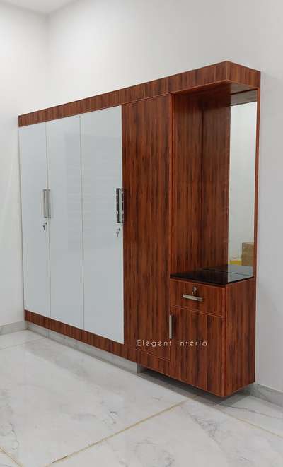 Aluminium profile with pvc sheet. Wood and white color
#bedroominteriors  #4DoorWardrobe #WardrobeIdeas  #WardrobeDesigns