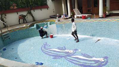 Renovation of swimming pool tiles at Ernakulam