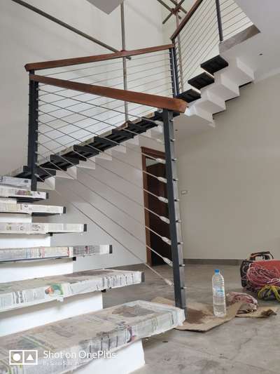 Unique and stylish handrail with 3*2 teakwood on top,GI vertical legs,6mm ss ropes and rope fittings.