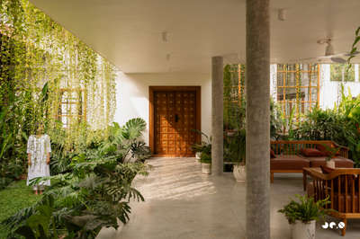 Arcade – Where arches, light, and landscape converse, and tradition finds a quiet 
contemporary soul.
Clients : @aarcha_vinod @ramvinodk 
Area: 4488 Sq.ft
Location: Bharanikavu, Kollam, Kerala.
Principal Architect/Designers: @ar.jun_v_a @_ar_anoop @ananthansurendran 
Interior Styling: Adheena Baburaj @dhii_design_studio 
Photography: @iksha.in #architecturedesigns  #KeralaStyleHouse  #TraditionalHouse  #interiordesignerkerala  #Architectural&Interior   #architectsinkerala