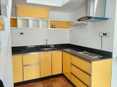 aluminium modular kitchen with planilaque glass 
9745456519