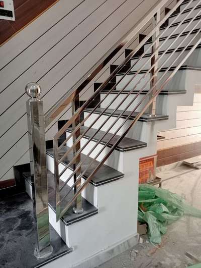 Stainless Steel Hand Railing
This sleek and modern stainless steel railing adds a touch of elegance to any staircase. The clean lines and polished finish create a contemporary look that complements a variety of interior styles.  #railing  #StaircaseHandRail  #Railings  #railingdesign