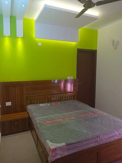 This is interior work done according to the client's taste at Kottayam, Skylane, Oasis Villas. Colors and design were chosen to meet the client's requirements. For details, please contact Selma L. Indriyas at 944-6444-810.