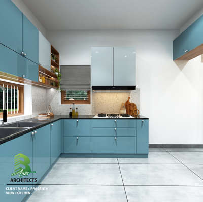 Pastel blue kitchen with sleek black countertops and smart storage 💡🏠

Client: Prasanth
Area : Kitchen