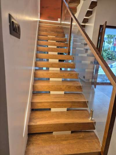 “Every step tells a story of craftsmanship.”
Premium finish | Minimal design | Perfect lighting 
 #kannurdesigner #InteriorDesigner  #StaircaseDecors #constructionsite #HomeDecor #Architectural&Interior