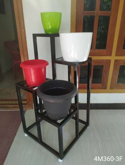 METAL STAND FOR INDOOR PLANTS.
 
Durable, Eco friendly. Rest free, Not harmful for any floor, Adjustable legs for leveling.