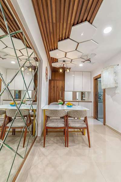 dining space 🔥 #InteriorDesigner  #KitchenInterior  #DINING_TABLE  #TexturePainting  #WallDecors  #mirrorunit  #FalseCeiling  #WoodenCeiling  #ModularKitchen  #KitchenIdeas  #BestBuildersInKerala  #kozhikkode