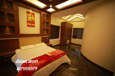 # master bedroom interior
#kingsizebed 
#4DoorWardrobe 
#GypsumCeiling 
#wooden ceiling
# plywood cladding