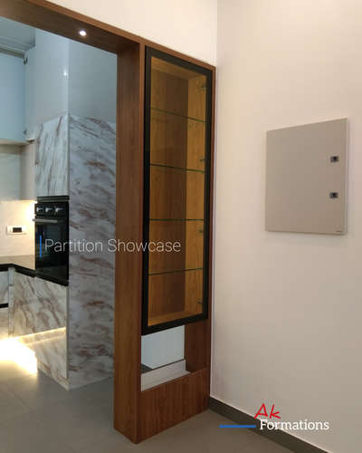 Partition Showcase : Dining to Kitchen : From Recently completed project @ Koratty, Thrissur 
.
.
.
 #partitiondesign #crockerydesign #InteriorDesigner  #Architectural&Interior