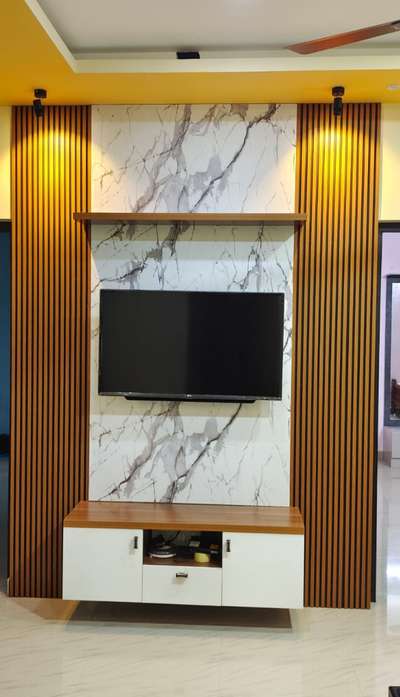 MODERN TV UNIT  #LivingRoomTVCabinet  #moderntvunit  #LivingRoomTV  #LivingRoomDecors  #LivingRoomCeilingDesign  #MrHomeKerala  #keralastyle  #Architectural&Interior  #architecturedesigns  #colourcombination  #plywood710  #marblemica