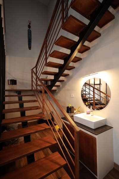 Check out this stunning steel and wood combination staircase that we installed in one of our recent projects! 😍🙌

But we didn't just stop there – we also used the space under the staircase for a wash basin installation, maximizing its functionality and style. 

By combining different materials and smart design, we were able to create a unique and practical solution for our client's home. 👌

What do you think of this creative use of space? Let us know in the comments! 💬

#staircasedesign #steelwoodstaircase #washbasin #spacemanagement #interiordesign #homedecor #creativity #functionality