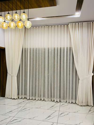 Omra curtains 
Full wall ripple fold curtain..
8281559850