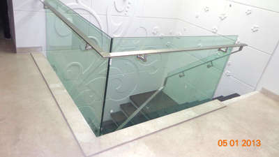 GLASS RAILING & STAINLESS STEEL TOP