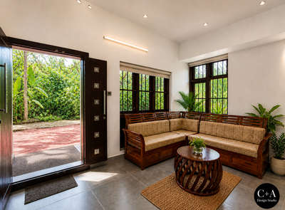 “A home where light, air & design meet beautifully ✨”

Mr. Anuraj Residence | Cherthala
A thoughtfully designed residence blending modern functionality with warm, earthy aesthetics. The space highlights natural light, ventilation, and material harmony, creating a calm and inviting living experience.
The double-height area with jaali wall design enhances airflow and diffused daylight, while the wooden staircase and textures add richness and warmth to the interiors. Carefully curated elements and greenery bring a subtle connection to nature.
Designed & Executed by C+A Design Studio
📍 Location: Cherthala
📐 Project Type: Residential Interior & Architecture
✨ Style: Modern with Traditional Touch
 
#C+ADesignStudio
#KeralaHomes
#KeralaArchitecture
#CherthalaHomes
#DreamHomeKerala
#ModernKeralaHome
#HomeDesignIndia
#InteriorDesignKerala
#HouseDesignInspiration
#IndianHomes
#LuxuryHomesKerala
#MinimalDesignIndia
#ContemporaryKerala
#ArchitectLife