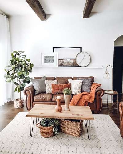 Add a rustic earthy appeal to this white room with shades of brown. Go for a brown sofa with cushions in colours ranging from cream to tan. Add a wooden coffee table with metal legs. Vases and baskets in the natural colours add to the look.
#interior #decor #ideas #home #interiordesign #indian #colourful #decorshopping