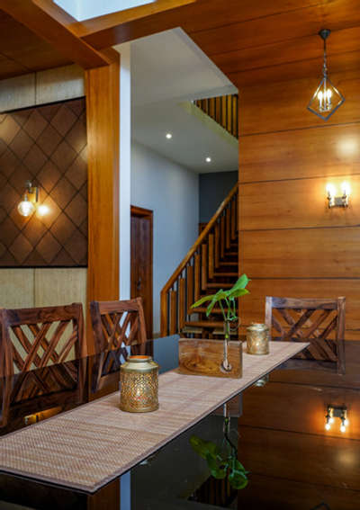 Dinning  #DiningTable  #DiningChairs  #RoundDiningTable  #InteriorDesigner  #WoodenStaircase  #GlassHandRailStaircase  #CelingLights  #LivingroomDesigns  #architecturedesigns  #FrontDoor  #SlidingDoors  #DoorDesigns  #Malappuram  #calicut  #Thrissur  #Palakkad  #KeralaStyleHouse  #ContemporaryHouse