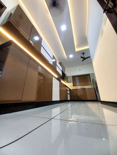 completed kitchen at olarikkara  #KitchenIdeas  #LargeKitchen  # #ModularKitchen  #modularkitchenkerala #KitchenCabinet #KitchenCeilingDesign   #KitchenInterior  #KitchenDesigns #KitchenLighting