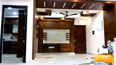 Hall interior vineer work 1500/- per sqft