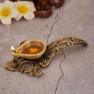 You can complete the decor for your Pooja Room in unique style.

This stylish spoon diya is artistically crafted and engraved in beautiful manner. It has an ample space to keep oil in it and due to the handle it does not burn your hands while performing Aarti.
#homedecor #home #decor #design #homedesign #handmade #art #decoration #homedecoration #love #vintage #homestyle #ihomeinspo #walldecor #diy #inspiration #smallbusiness #style #brass #brassdecor #diya #spoondiya #decorshopping